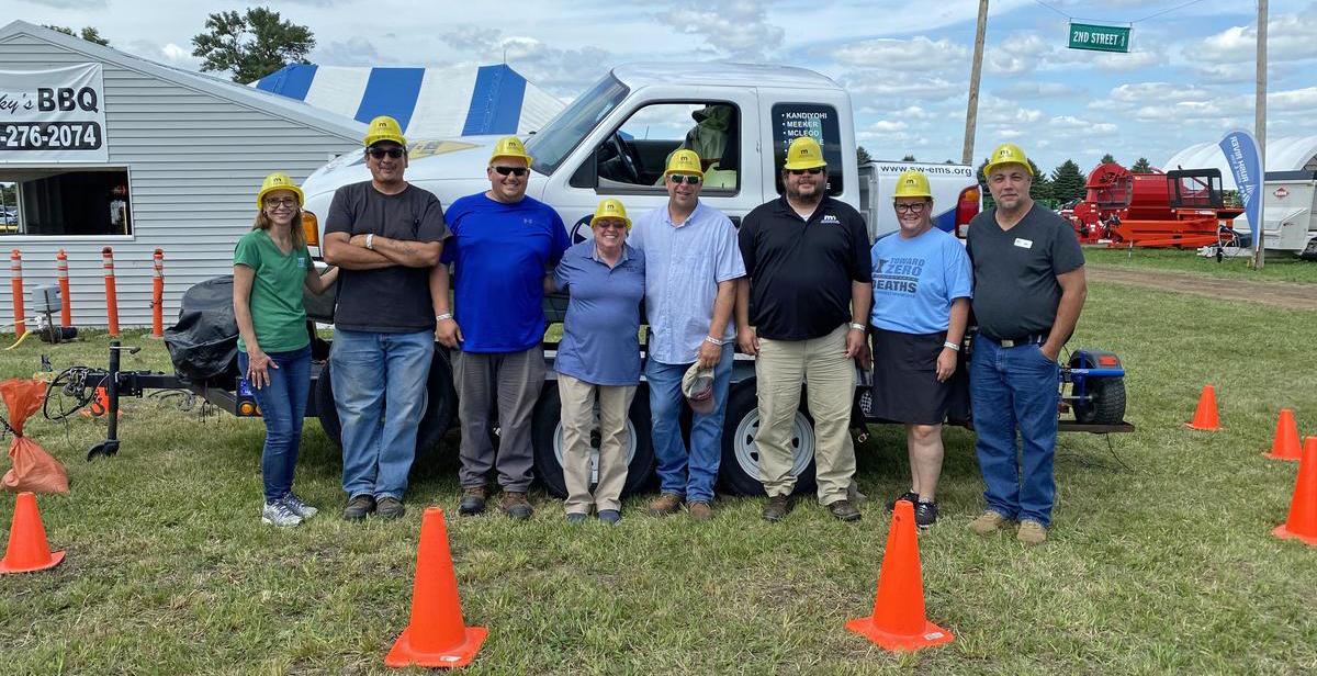 A group of people wearing hard hats